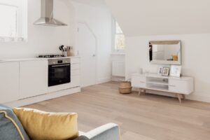 Spacious and cozy living area with modern style and natural light.