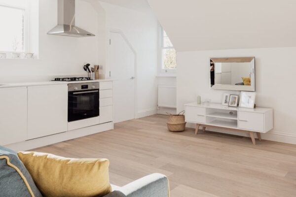 Spacious and cozy living area with modern style and natural light.
