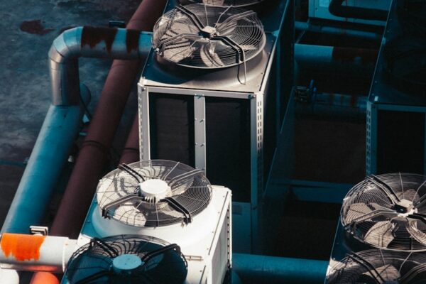 a group of air conditioners sitting next to each other